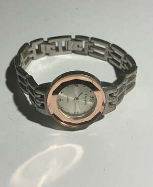 Details Quartz Women's Two-Tone Rose Gold and Silver Faceted Bezel Watch